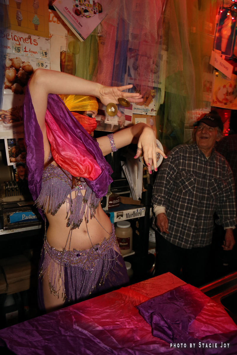 Amanda performs the dance of the veils at the start of her dance for Ray's birthday. Photos by Stacie Joy