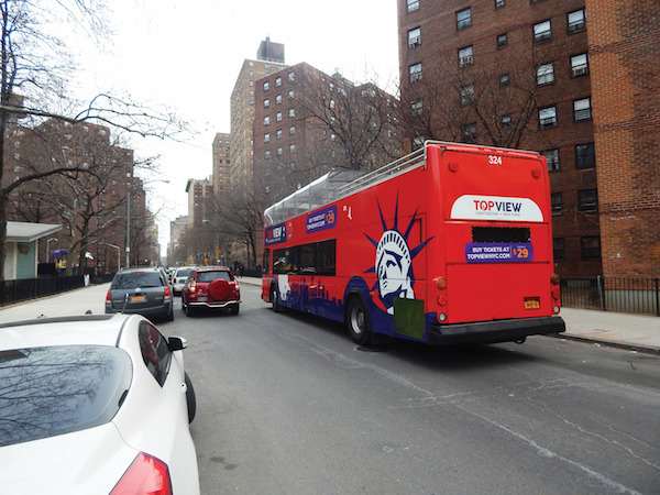 Turn Restriction Shifts Tour Buses to Side Streets 3 A bus cruising eastbound on W. 26th St. between 10th and Eighth Aves. will pass a community center, a day care, an elementary school, a playground, and a city park in those two blocks. Photos by Dennis Lynch.