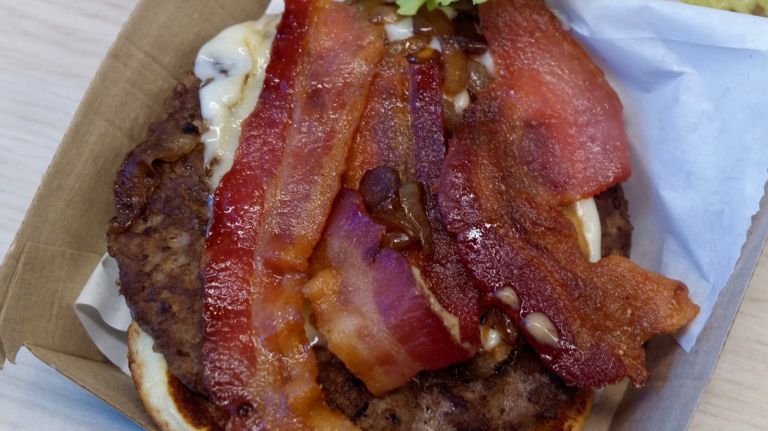 French-inspired McDonald's debuts in NYC 16 Here's a look inside the Maple Bacon Dijon burger, which costs $5.95.