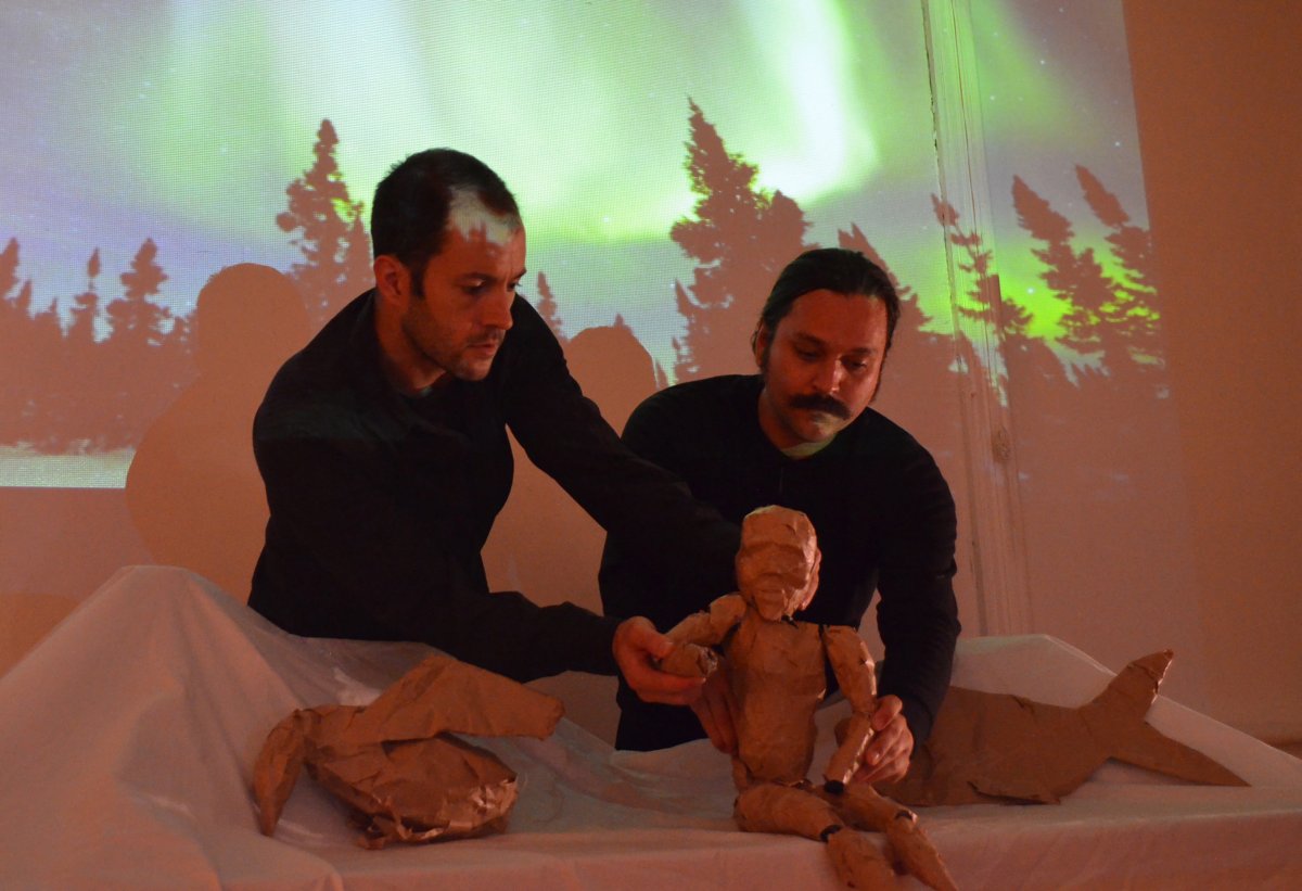 Collaborators Ryan Conarro and Justin Perkins working with a puppet and video for the new Ping Chong + Company project.