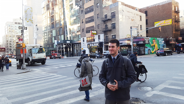 Wyatt Frank in the crosswalk, while touring a neighborhood at a crossroads. Photo by Dusica Sue Malesevic