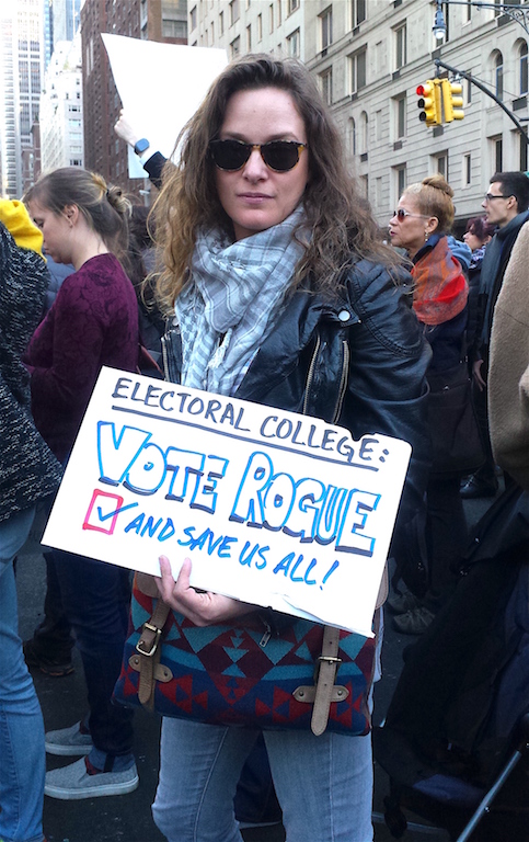 A protester at one of the "Not My President" marches after Trump's election called on Electoral College members to buck voters and dump drop. Villager file photo