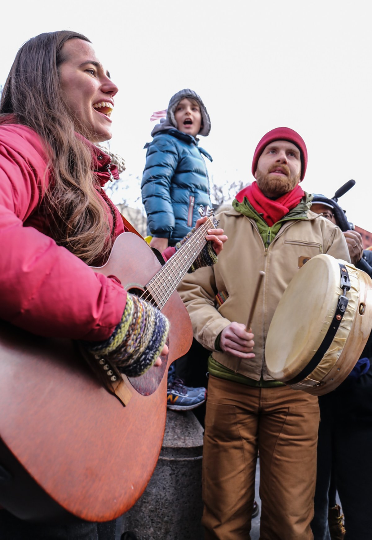 ’60s anthems suddenly back in style 5 "It's the sounnnd of freedommm!" Hammering home a positive message at the sing-along in Washington Square. Photos by Tequila Minsky