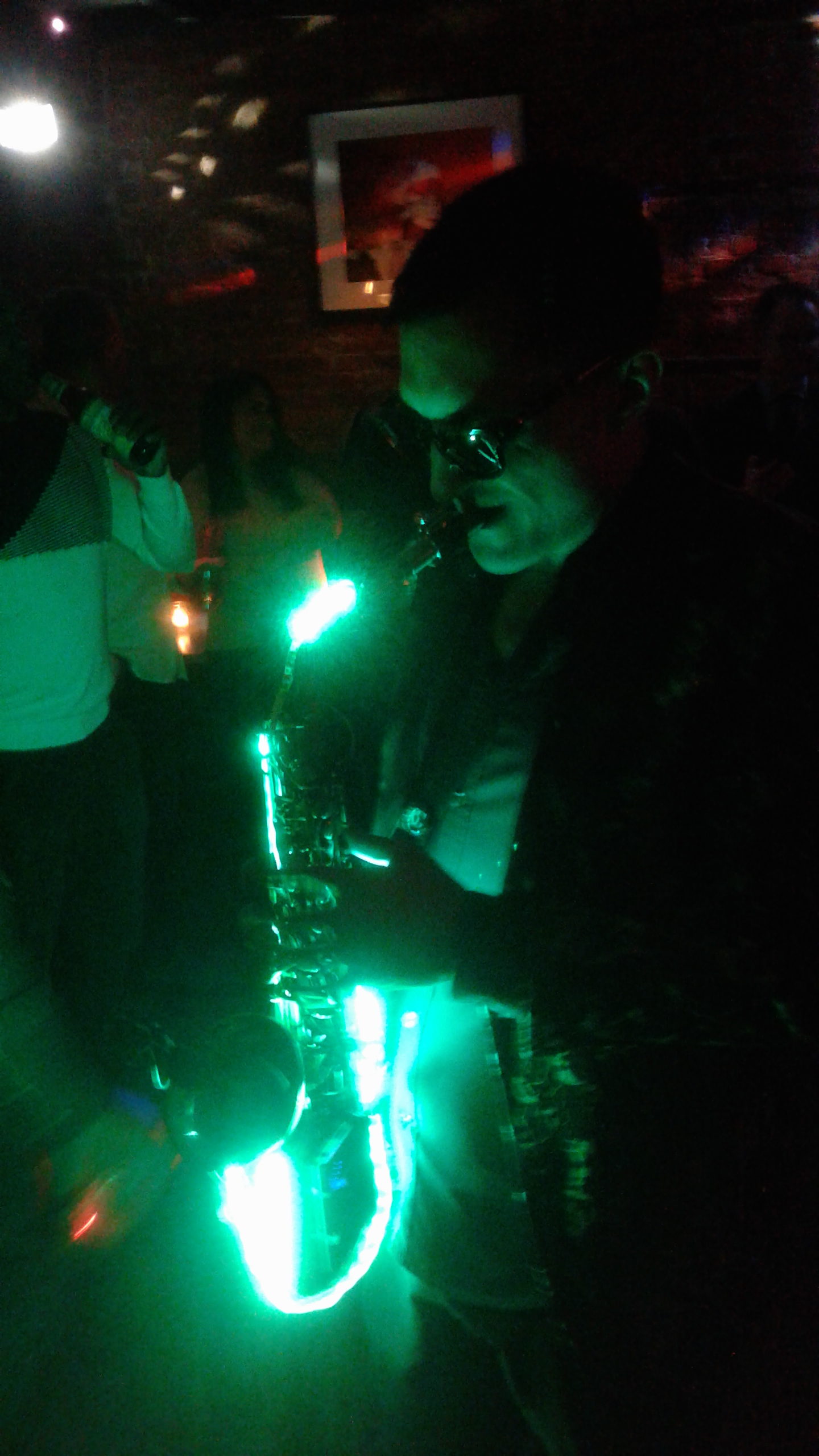 A sax player got green at Patrick McMullan's St. Patrick's party while he jammed along with the dance beats. Photos by Scoopy