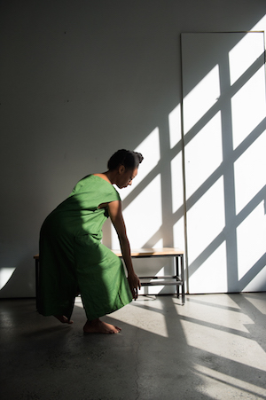 Fana Fraser performed her work, “Stillbirth,” last August as part of an evening that examined credit. Photo by Corey Melton.