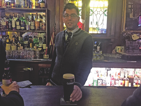 Ace the De-Stress Test at Chelsea’s Best Recharging Stations 4 Fourth-generation Peter McManus Café owner Justin McManus serves up a well-poured Guinness. File photo by Dennis Lynch.