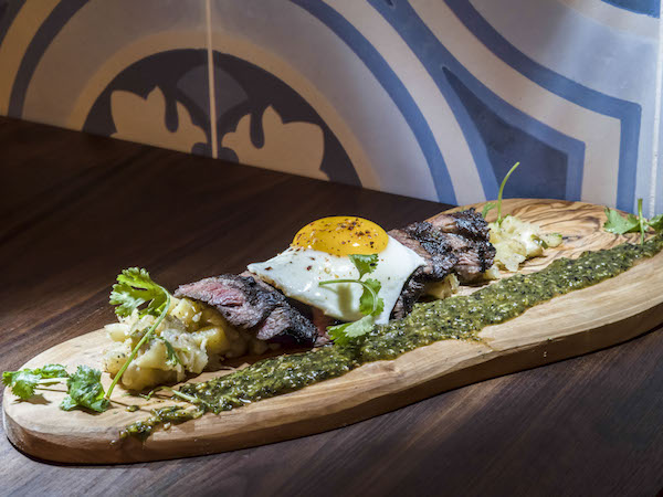 Ace the De-Stress Test at Chelsea’s Best Recharging Stations 7 Iconic and delicious: Sons & Daughters’ Steak & Eggs dish (grilled skirt steak, yucca hash, tomatillo salsa). Photo courtesy Sons & Daughters of NYC.