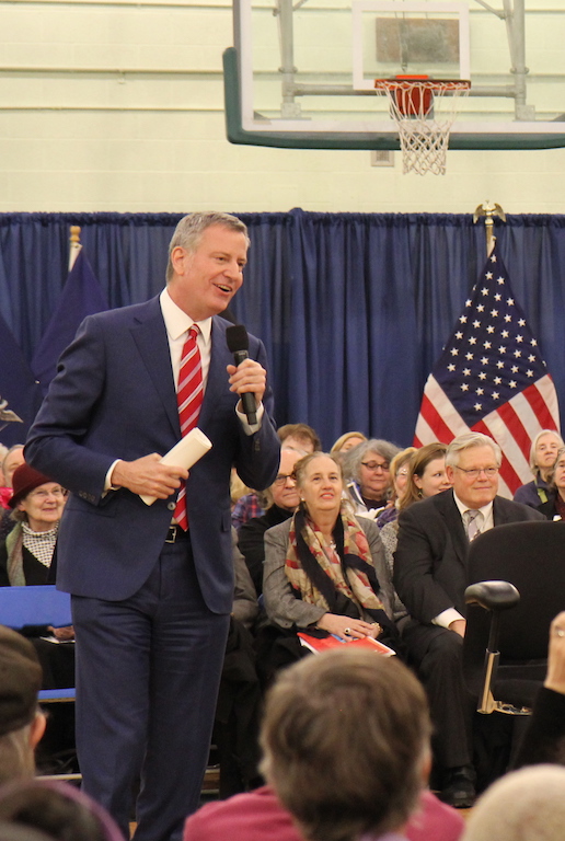 Mayor de Blasio in a light moment during the town hall, as to the right of him, Borough President Gale Brewer and former state Senator Tom Duane listened. Photo by Dennis Lynch