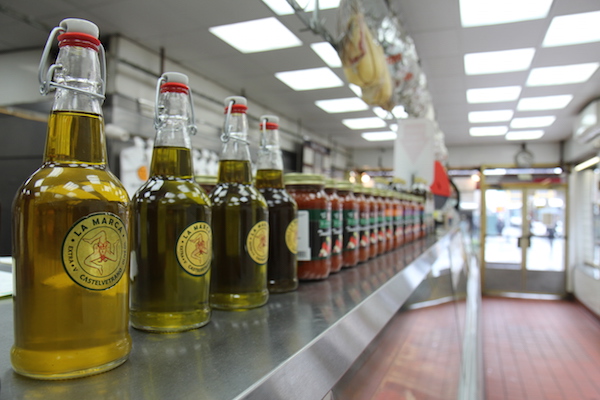 No Bones About It: Esposito Meat Market Endures 4 Esposito also sells ingredients you’ll need for a good Sunday sauce or steak dinner. Photo by Dennis Lynch