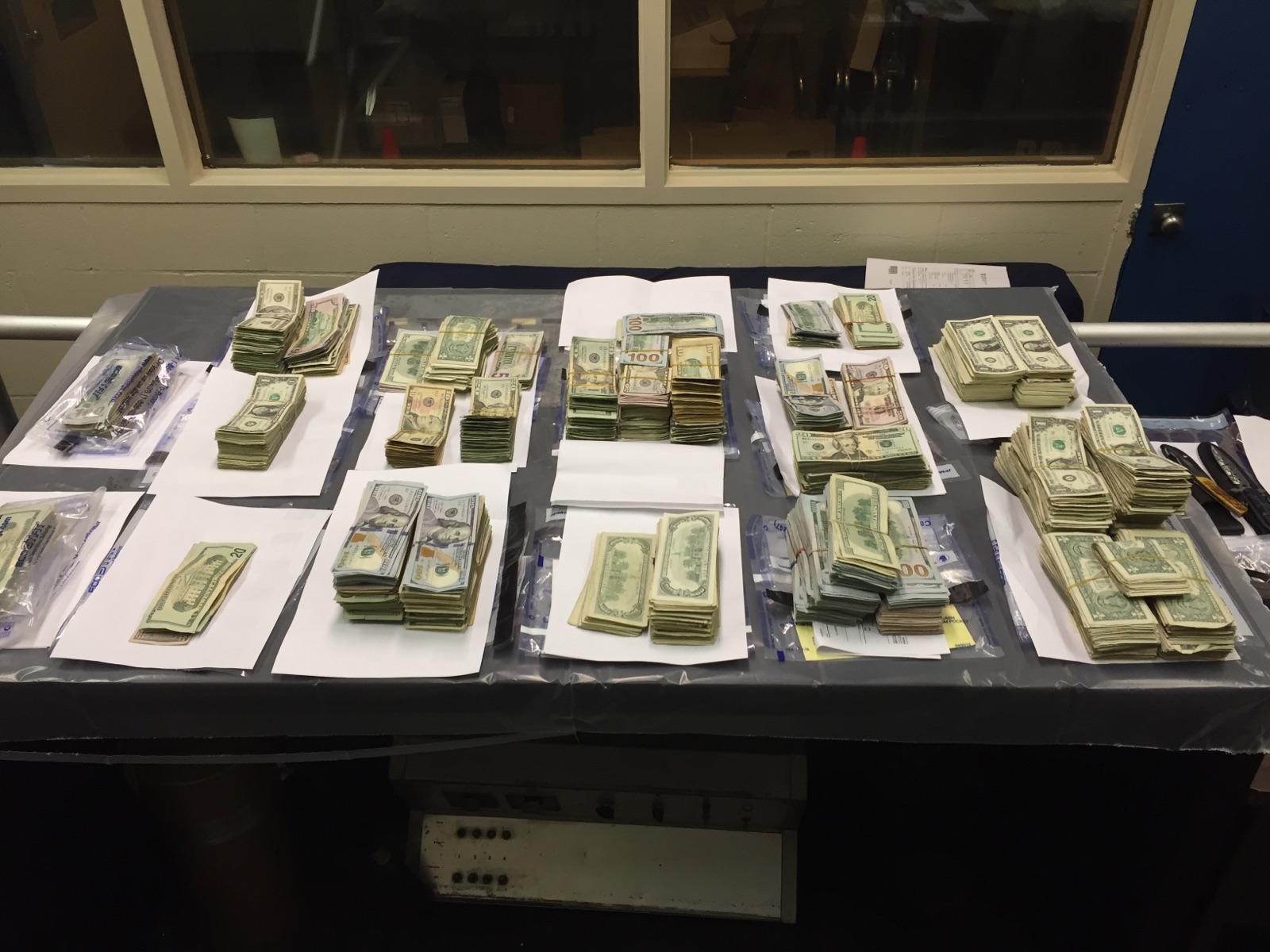 Stacks of money seized by police in busts of the Gonzalez twins and their associates.  Photo courtesy N.Y.P.D.