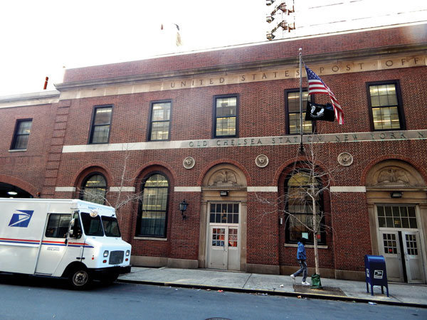 The USPS wants to move services from the Old Chelsea Station, pictured here, to a temporary location while a private developer builds condos above the station. Photo by Scott Stiffler.
