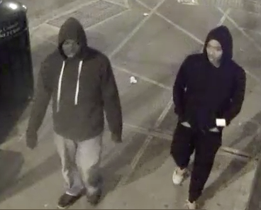 A surveillance-camera image of the two alleged suspects who choked a senior man on Sixth Ave. and stole his money. Photo courtesy N.Y.P.D.