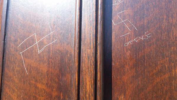 Councilmembers Endorse $25 Million for Institutions Targeted by Hate 1 Vandalism on the doors of the Fourth Universalist Society includes a reference to the "race office" from Germany's Nazi era. JACKSON CHEN