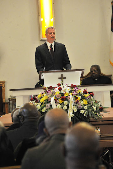 Mayor Bill de Blasio offers a tribute to Timothy Caughman. | NAT VALENTINE