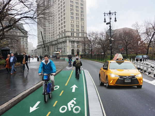 NYC DOT The city's plan would give cyclists a protected bike lane to access the Brooklyn bridge.