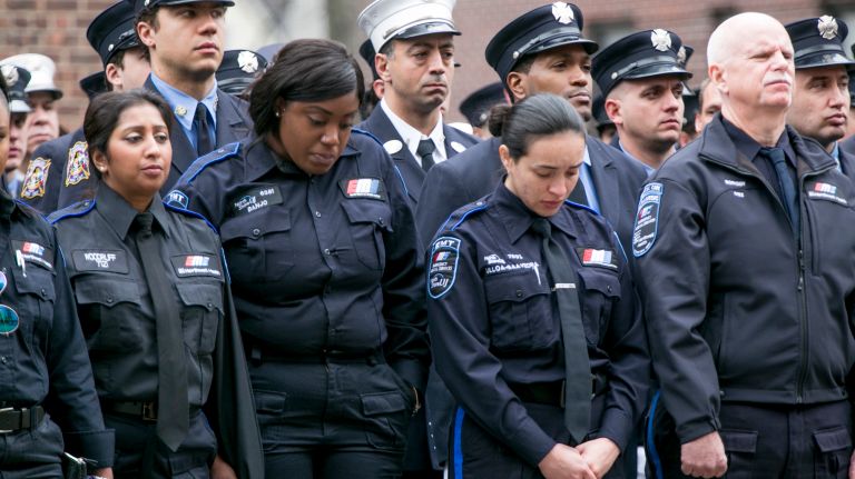 Emergency medical technicians were among those assembled Saturday, March 25, 2017, for the funeral of Yadira Arroyo, 44, at St. Nicholas of Tolentine Roman Catholic Church on University Avenue in the Bronx.