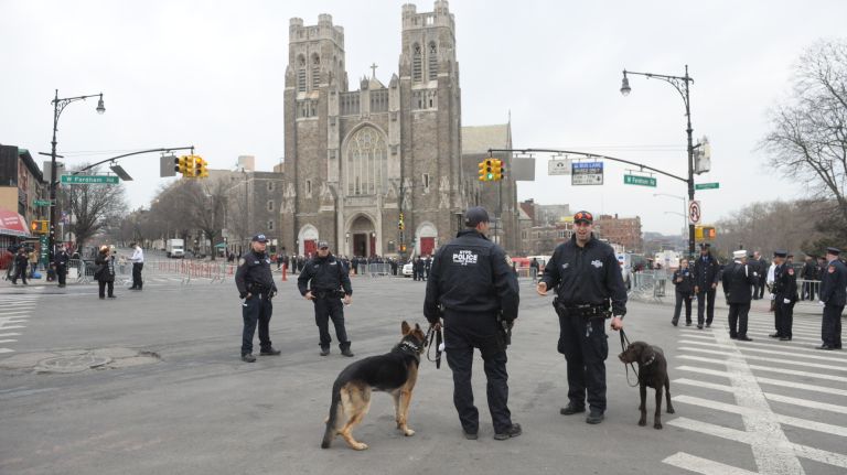 Security is set up Saturday, March 25, 2017, outside St. Nicholas of Tolentine Roman Catholic Church on University Avenue in the Bronx for the funeral of FDNY EMT Yadira Arroyo.