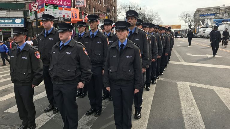 Mourners gather to attend the funeral of slain FDNY EMT Yadira Arroyo on Saturday, March 25, 2017. Arroyo, 44, the mother of five children, was killed during an attempted carjacking of her ambulance in the Bronx on March 16.
