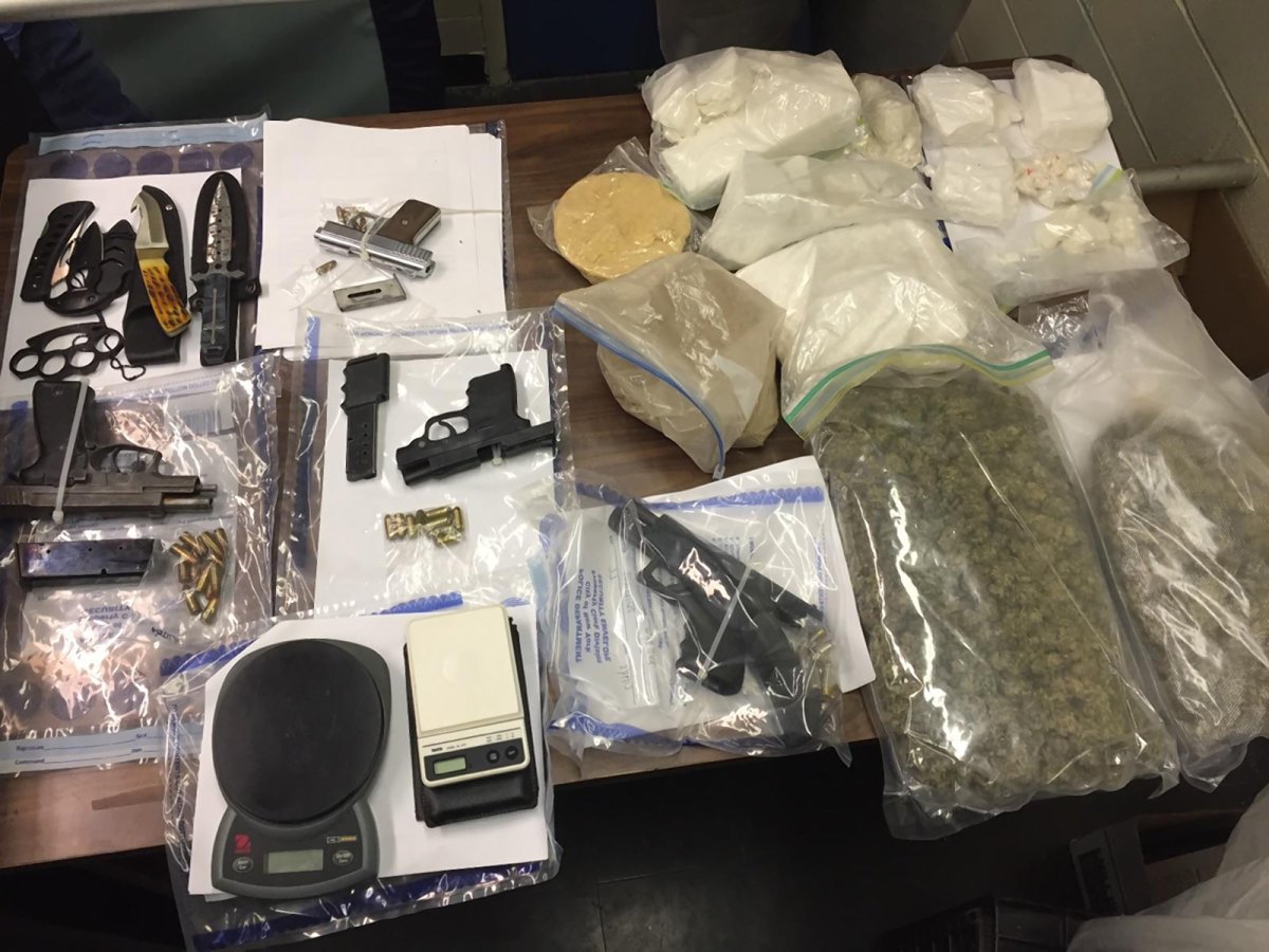 Weapons, drugs and scales seized by police in the March 16 raid of the Gonzalez brothers and their accomplices. Photo courtesy N.Y.P.D.