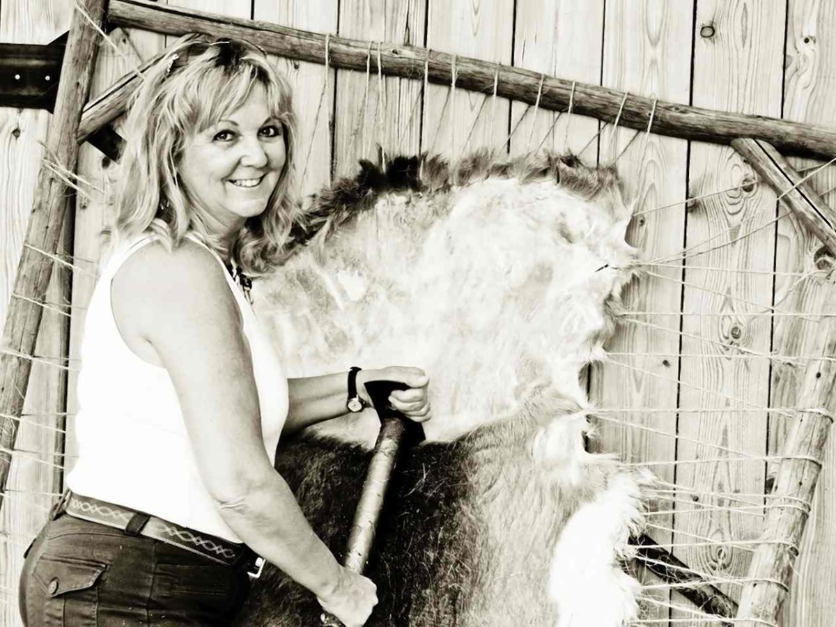 Deborah Hinter, an Alberta woman who married a trapper, talks on the Web site TruthAboutFur.com about the “heritage of the bush” and the “calming rhythm of learning to dry scrape rawhide. Photo courtesy Alan Herscovici