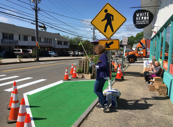 Transportation Alternatives / Michael Lydon So-called “tactical urbanism” makes temporary changes to the streetscape — like this crosswalk-shortening “neckdown” — to show the public what effect permanent versions could have, with the aim of building grassroots support.