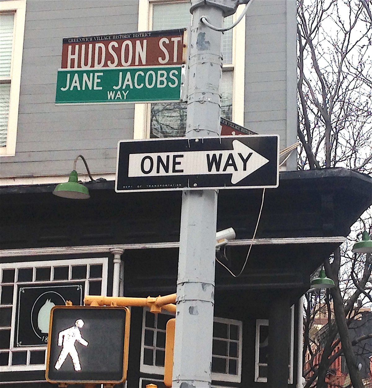 Given Jane Jacobs’ outsize role in preserving the Village, there is little in the way of tribute to her locally, save for this street co-naming sign outside the White Horse Tavern on the block where she lived. Photo by Sara Hendrickson