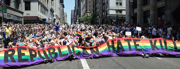 In the 2016 Pride March, Gays Against Guns protesters take on the Republicans. Photo by Donna Aceto.