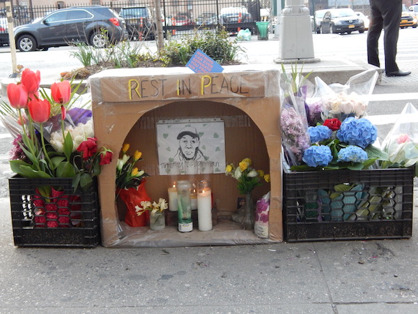 A memorial for Timothy Caughman, on W. 36th St. & Ninth Ave., the site of his March 20 murder. Photo by Sean Egan.