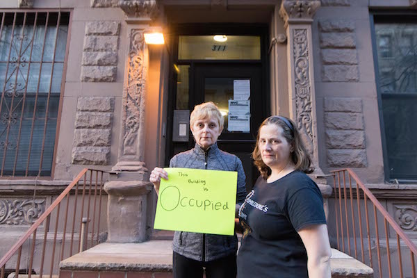 L to R: Kelly Maurer and Alison Moore are among a new breed of tenants with the savvy to document and challenge falsely filed DOB permit applications. Photo by Caleb Caldwell.