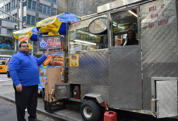 A coffee and breakfast street vendor at 59th Street and Lexington Avenue finishing up the day and preparing to return to the commissary. | JACKSON CHEN 