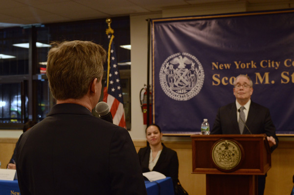 CB7 member Mel Wymore offers his views on the decline of local small businesses to Stringer. | JACKSON CHEN