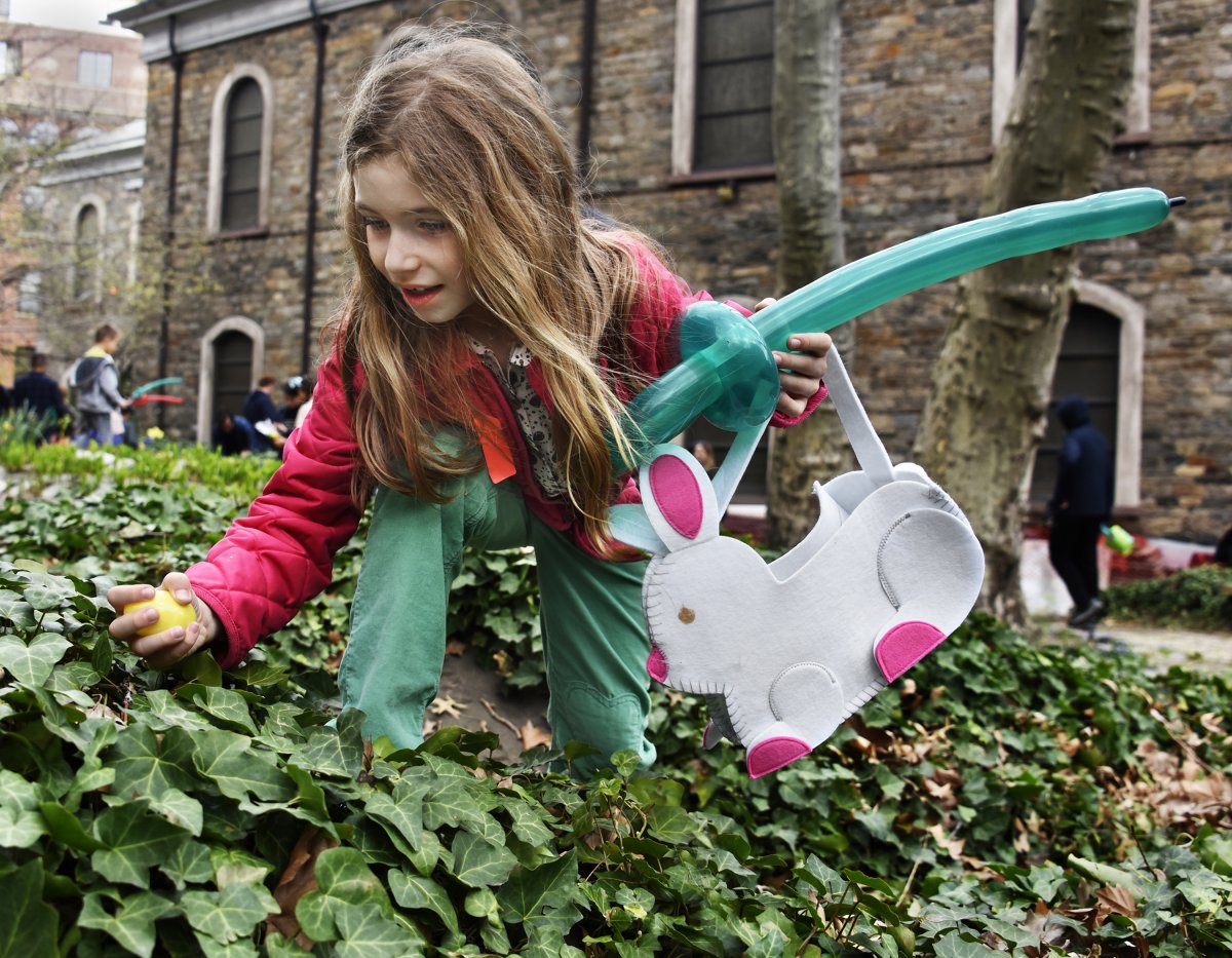 St. Mark’s ‘egg scramble’ a sweet success 3 Lisa, 7, armed with balloon sword and custom-made bunny basket, made a find at the Easter egg hunt at St. Mark’s Church.