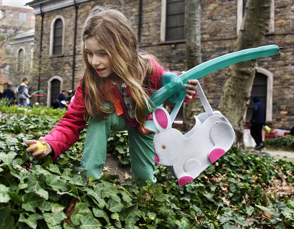 Lisa, 7, armed with balloon sword and custom-made bunny basket, made a find at the Easter egg hunt at St. Mark’s Church.