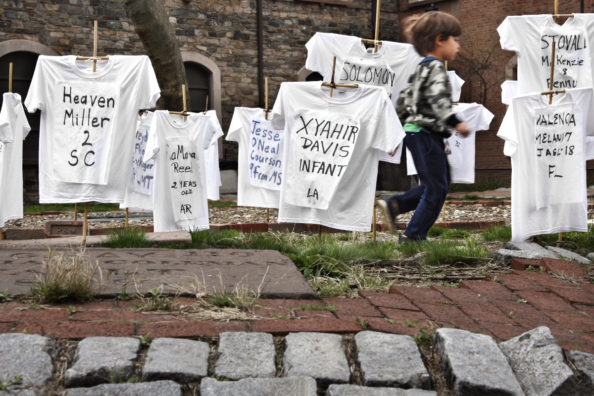 T-shirts symbolizing young victims of gun violence in the St. Mark's churchyard.