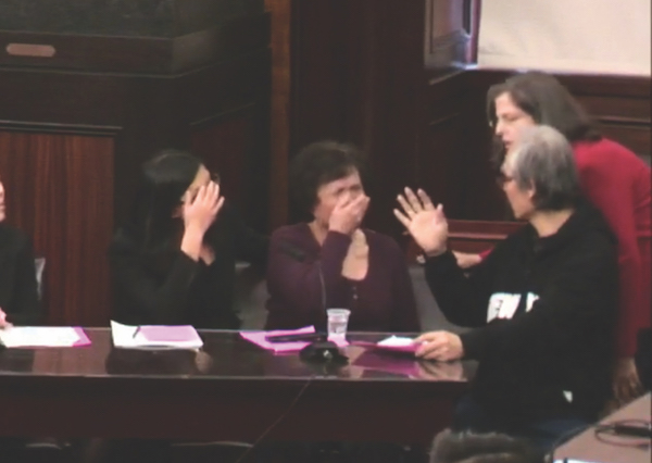 Councilmember Helen Rosenthal (at right) tries to comfort Xiao Ling Chen, who covers her face as she becomes overwhlemed giving testimony chronicling her family’s harassment at the hands of their landlord. | NYC.GOV