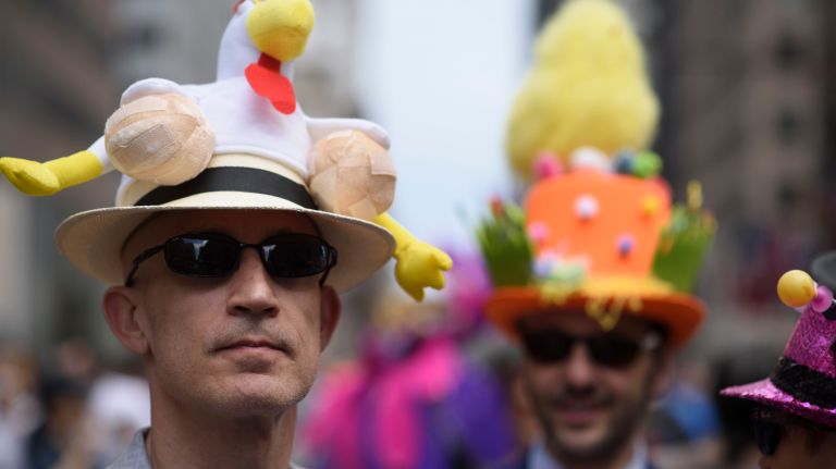 Participants and spectators stroll along Fifth Avenue during the Easter Parade and Bonnet Festival in Manhattan on Sunday, April 16, 2017. 