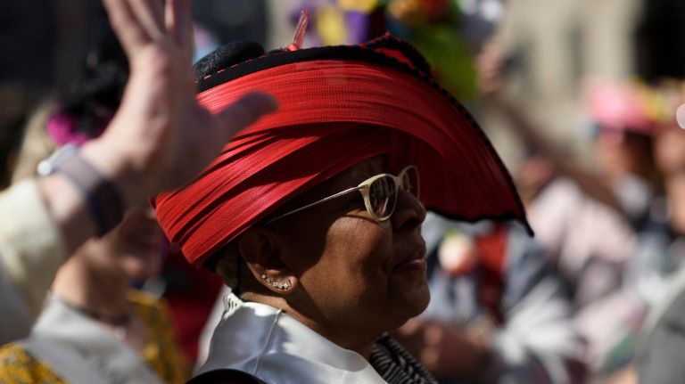 Participants and spectators stroll along Fifth Avenue during the Easter Parade and Bonnet Festival in Manhattan on Sunday, April 16, 2017.