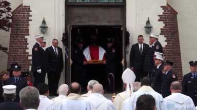 Thousands of mourners pay final repects to fallen firefighter William Tolley