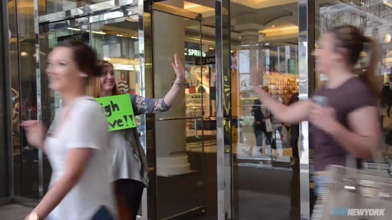 National High-Five Day in NYC a hand-slapping success