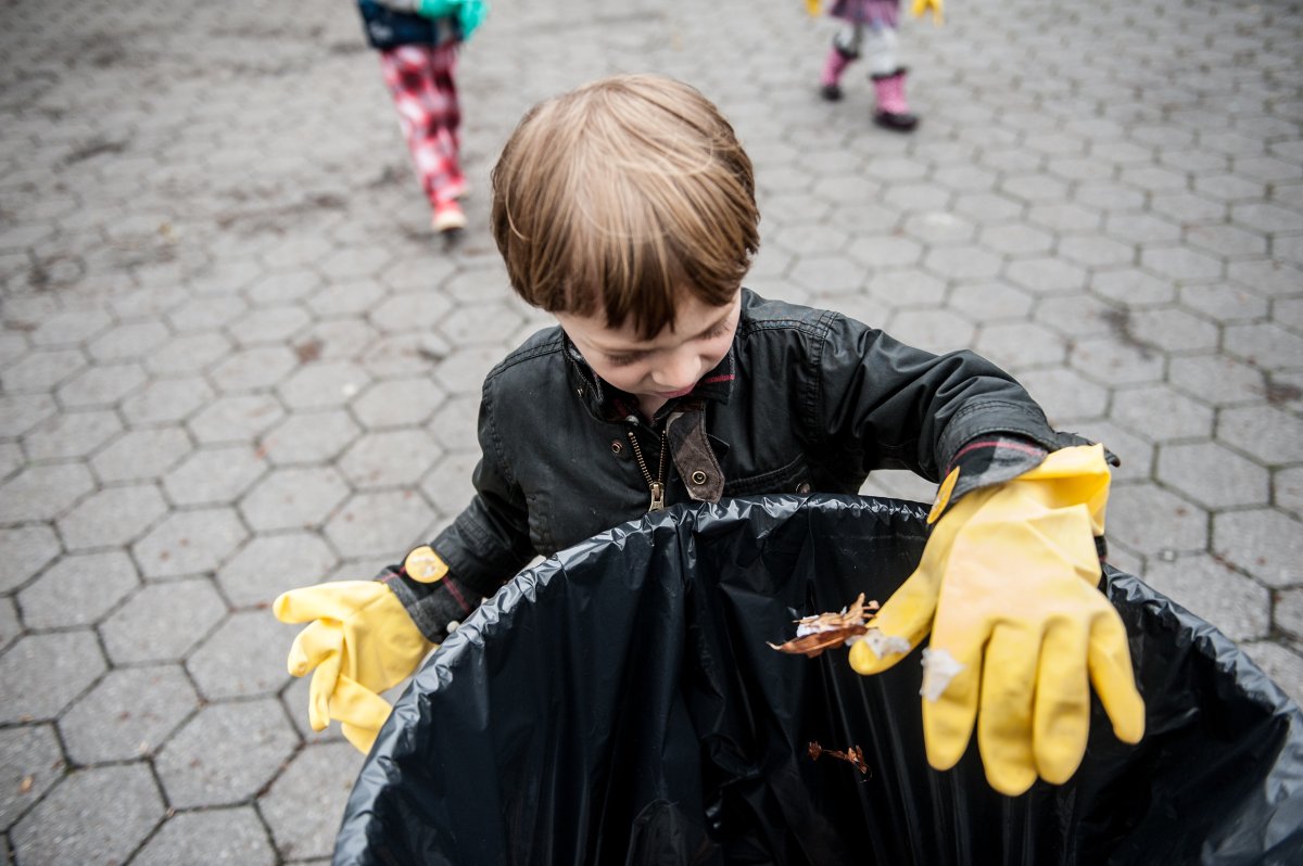 Brooks Leslie, 5, picked up trash in the park.