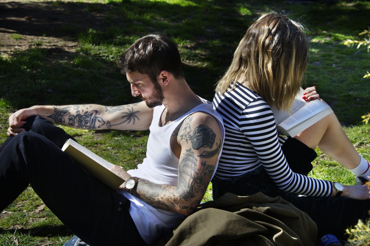 Reading some serious ink — and showing a lot, too — in Tompkins Square Park amid the beautiful — at last! — spring weather. Photo by Bob Krasner