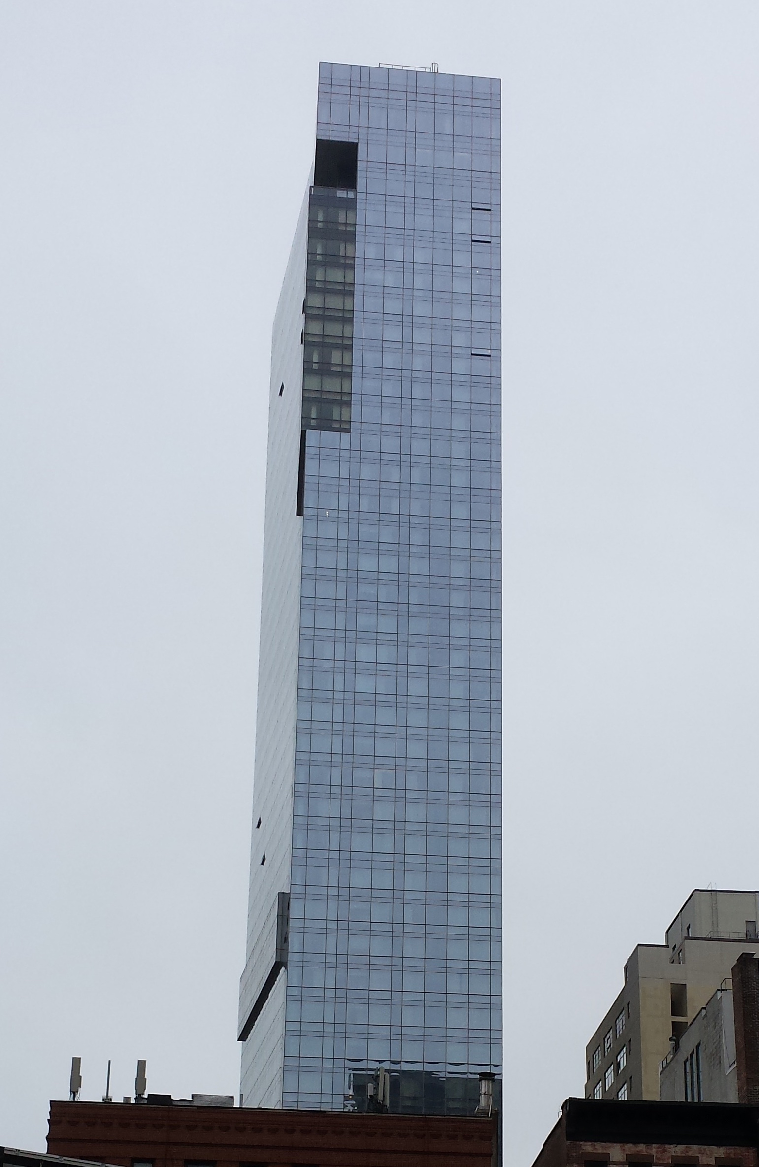 Looming over Soho and Lower Manhattan, the 46-story Trump Soho Hotel, at Spring and Varick Sts. Photo by Lincoln Anderson