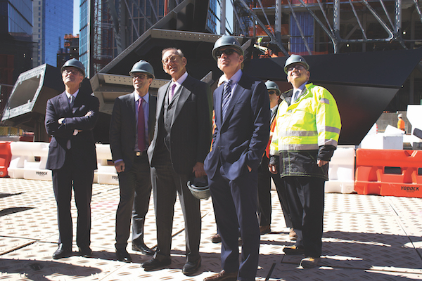 Related Companies chair Stephen Ross (third from left) and project executives on hand for the April 18 arrival of the first 10 pieces out of a total of 65 that will be part of Vessel in the Hudson Yards Public Square and Gardens, due to be topped off by the end of the year and open to the public in the fall of 2018. | BIANCA SILVA 