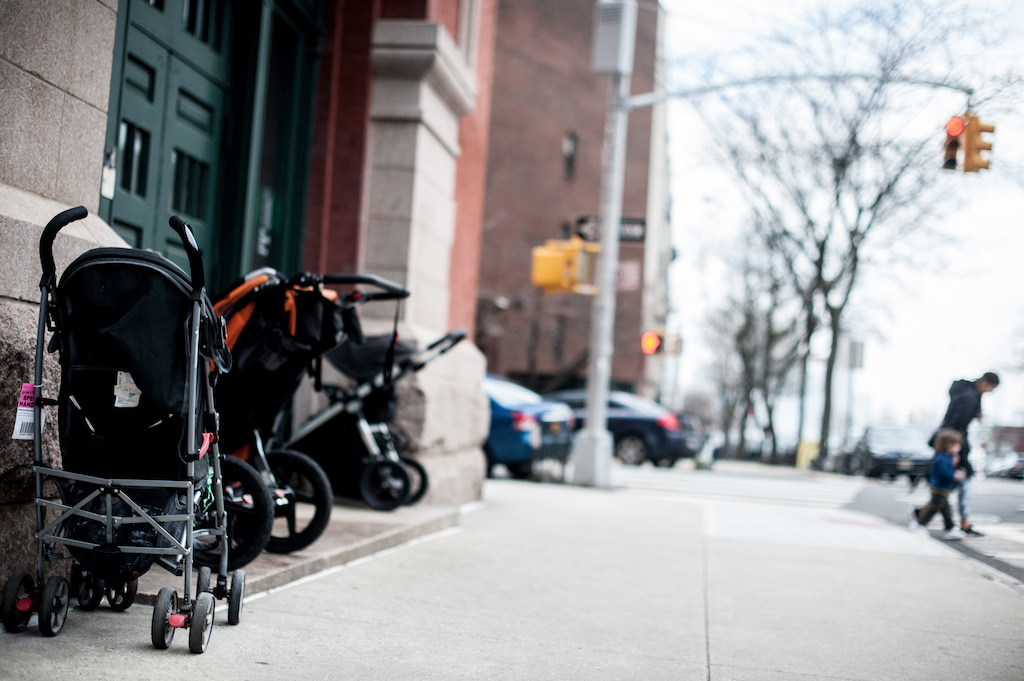 Stollers outside the Mandell pre-school at 160 Christopher St.