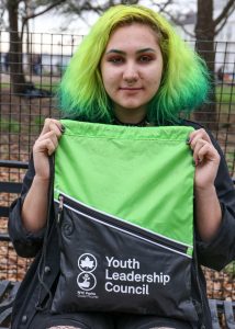 Photo by Tequila Minsky Volunteer Jessica Irimescu, an 11th-grader at Bard High School Early College, has been into community gardening since elementary school. Perhaps it should be no surprise that her hairdo perfectly matched the Green Thumb swag bags the Parks Department what handing out at the kick-off event for the summer community gardening program.