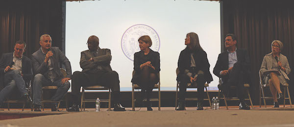 A Garment District panel discussion convened by Borough President Gale Brewer included (from left) George Kalajian, president of Tom’s Sons International Pleating; Steve Epstein, a representative of Theatrical Wardrobe Local 764; Edgar Romney, an official from Workers United; Barbara Blair, president of the Garment District Alliance; Yeohlee Teng, a designer for YEOHLEE Inc.; Joseph Ferrara, president of the New York Garment Center Supplier Association; and Susan Chin, executive director of the Design Trust for Public Space. | JACKSON CHEN