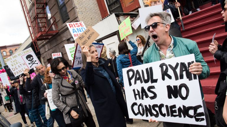 As House Speaker Paul Ryan visited a Harlem charter school, demonstrators turned out to channel liberal ire.