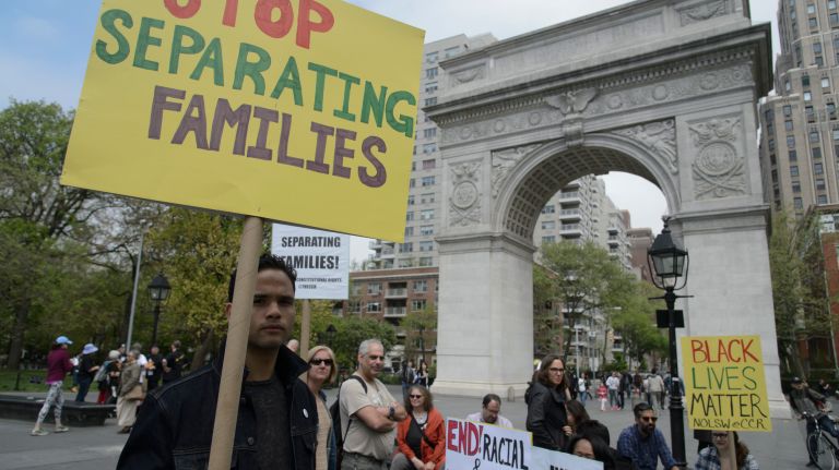 May Day protests: Photos of the 2017 NYC demonstrations 38 A man holds a sign during a May Day demonstration in Washington Square Park on Monday, May 1, 2017.