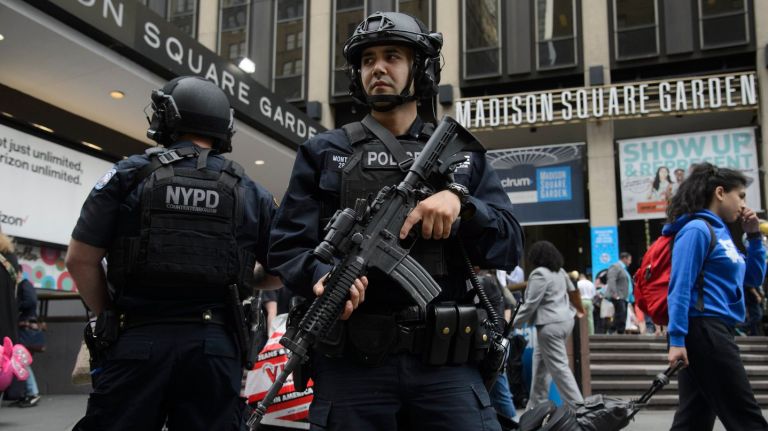 Security was increased in New York City after a deadly explosion carried out by a suicide bomber in Manchester Monday night, May 22, 2017, that UK police said killed 22 people, including children.