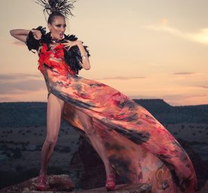 Photo by Unék Francis Navajo designer Orlando Dugi’s “Desert Heat” collection includes this ensemble of cape, dress, and headdress fashioned from silk, organza, beads, feathers, and porcupine quills.